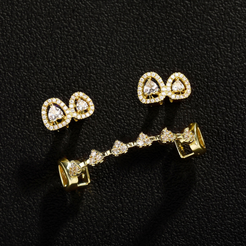 新型高級DIYトップボトムブリンブリンハートジルコン歯グリル - Body Jewelry High End のレビューと価格